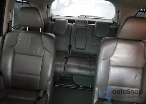 2011 Honda Odyssey Touring z USA, uszkodzony, nr VIN 5FNRL5H95BB070435